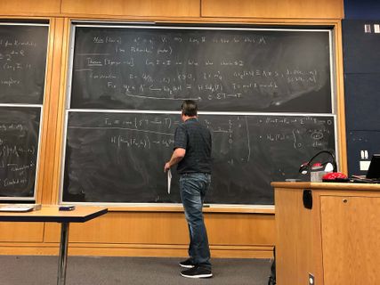 Mark Walker working at the chalkboard